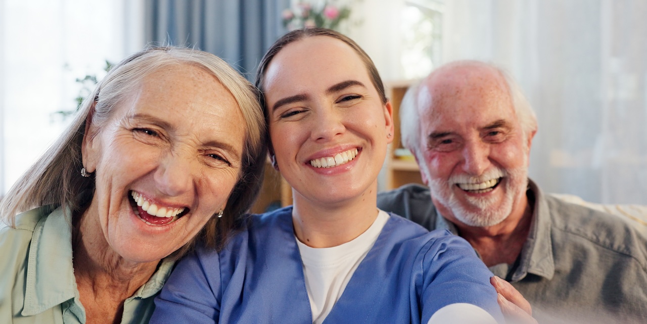 Nurse and senior adults take selfie for photography, elderly care or retirement in senior home.